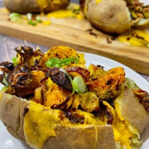 Buffalo Roasted Brussels, Fried Shallot and Vegan Cheese Stuffed Baked Potatoes